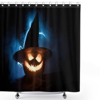Personality  Halloween Pumpkin Smile And Scary Eyes For Party Night. Close Up View Of Scary Halloween Pumpkin With Eyes Glowing Inside At Black Background. Shower Curtains