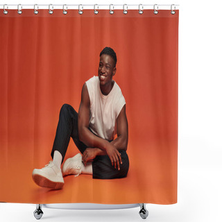 Personality  Happy African American Man In Stylish Street Wear Sitting On Red And Orange Backdrop, Full Length Shower Curtains