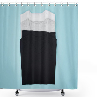 Personality  Top View Of Blank Basic Black, White And Grey T-shirts Isolated On Blue Shower Curtains