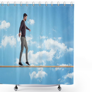 Personality  A Casually Dressed Man With A Beard Walks Carefully On A Tight Rope On A Sky Background. Shower Curtains