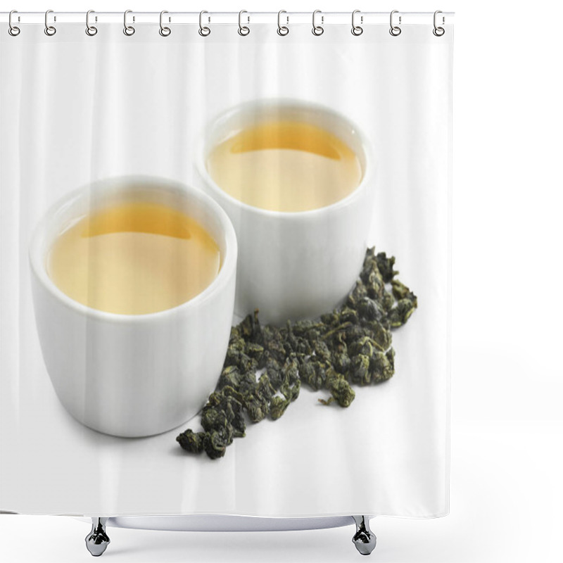 Personality  Cups Of Tie Guan Yin Oolong And Tea Leaves On White Background Shower Curtains