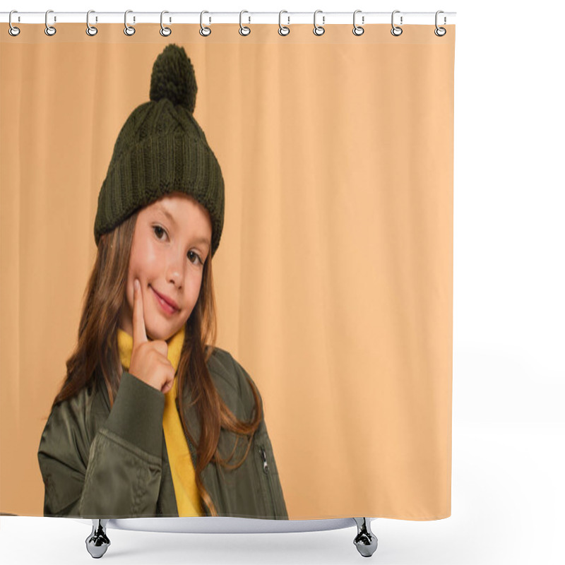 Personality  Trendy Kid In Knitted Hat Touching Face While Looking At Camera Isolated On Beige Shower Curtains