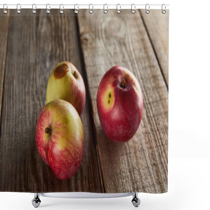 Personality  apples with rotten spot on wooden surface shower curtains