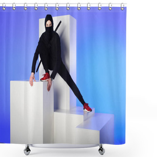 Personality  Ninja In Black Clothing With Katana Behind On White Block Isolated On Blue Shower Curtains