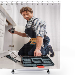 Personality  Selective Focus Of Handsome Repairman Holding Plastic Pipe Near Toolbox And Pipe Wrench On Floor In Kitchen  Shower Curtains