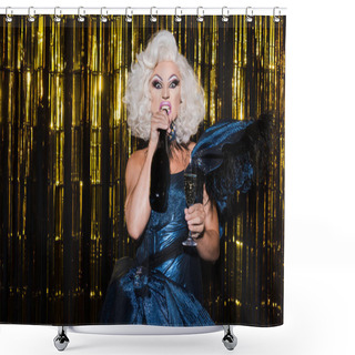 Personality  Grimacing Drag Queen With Bottle And Glass Of Champagne Looking At Camera On Golden Background Shower Curtains