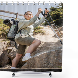 Personality  Low Angle View Of Young Short Haired Woman Traveler With Backpack Holding Trekking Poles And Looking Away While Standing Near Hill With Stones, Translation Of Tattoo: Love Shower Curtains