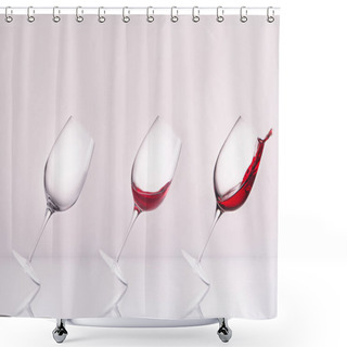 Personality  Row Of Inclined Wineglasses Empty And With Splashing Wine On Reflective Surface And On White Shower Curtains