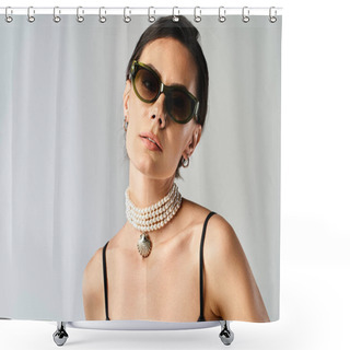 Personality  A Stylish Woman Poses Confidently Wearing Sunglasses And A Statement Necklace In A Studio On A Grey Background. Shower Curtains