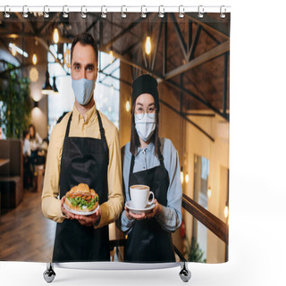Personality  Friendly Multiracial Waiters Wearing Protective Masks Stand Inside A Restaurant, Cafe Or Bar. The Guy Holds A Fresh Sandwich And The Girl Holds A Cup Of Aromatic Coffee Shower Curtains