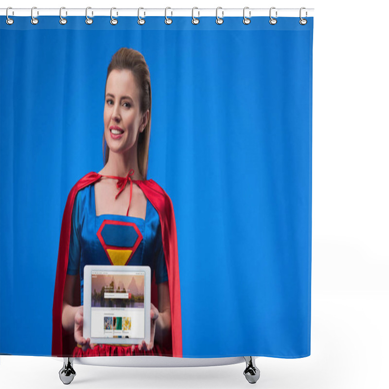 Personality  Portrait Of Cheerful Woman In Superhero Costume Showing Tablet Isolated On Blue Shower Curtains