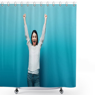 Personality  Happy Brunette Asian Woman With Hands In Air On Blue Background Shower Curtains