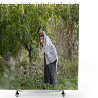 Personality  Hunza Valley, Pakistan - October 2019: Pakistani Old Woman In Traditional Clothes Gathering Harvest In Garden . Hunza Valley, Gilgit Baltistan, Pakistan Nothern Areas Shower Curtains