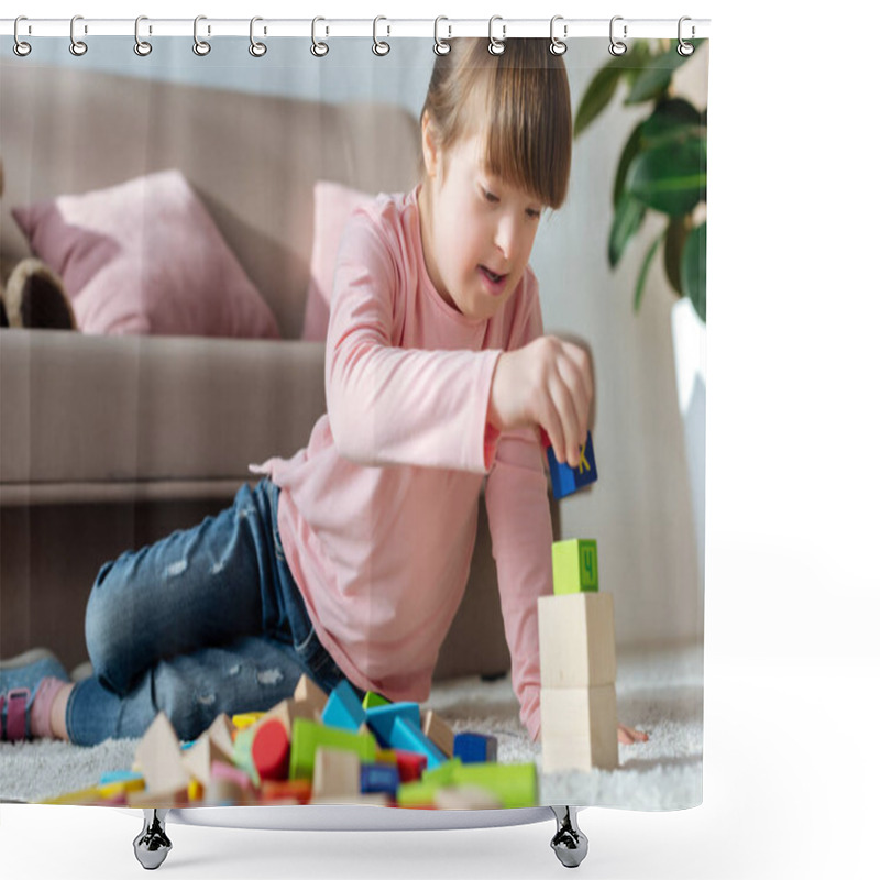 Personality  Child with down syndrome playing with toy cubes on floor in cozy room shower curtains