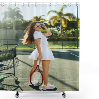 Personality  Stylish And Young Brunette Woman With Long Hair Standing Confidently In White Outfit, Tennis Skirt, Cropped T-shirt And Trendy Sunglasses While Holding Racket Near Ball Cart Near Palm Trees In Miami  Shower Curtains