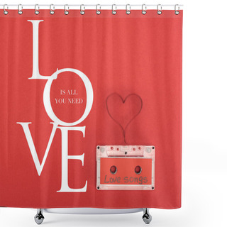 Personality  Elevated View Of Audio Cassette With Lettering Love Songs And Heart Symbol Made Of Tape Isolated On Red, St Valentine Day Concept With 