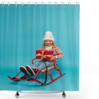 Personality  Cheerful Kid In Sled Holding Red Gift Box While Looking At Camera On Blue Shower Curtains