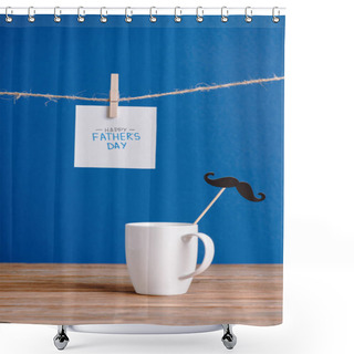 Personality  Selective Focus Of White Cup With Decorative Paper Fake Mustache And White Greeting Card With Lettering Happy Fathers Day Isolated On Blue Shower Curtains