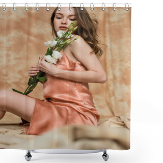 Personality  Graceful And Pretty Young Woman In Pink Silk Slip Dress Sitting On Blurred Linen Fabric And Holding White Flowers On Mottled Beige Background, Sensuality, Sophistication Shower Curtains