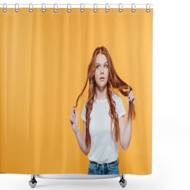 Personality  beautiful redhead girl touching hair and looking away isolated on yellow with copy space shower curtains