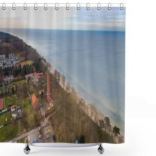 Personality  A Drone Shot Displays Gaski Beach, West Pomeranian Voivodeship, Poland, With A Red Brick Lighthouse, Baltic Sea, Sandy Beach, Leafless Dune Trees, Holiday Cottages, Hotels, And Homes. Possibly Calm Sea. Captured In February Winter. Shower Curtains