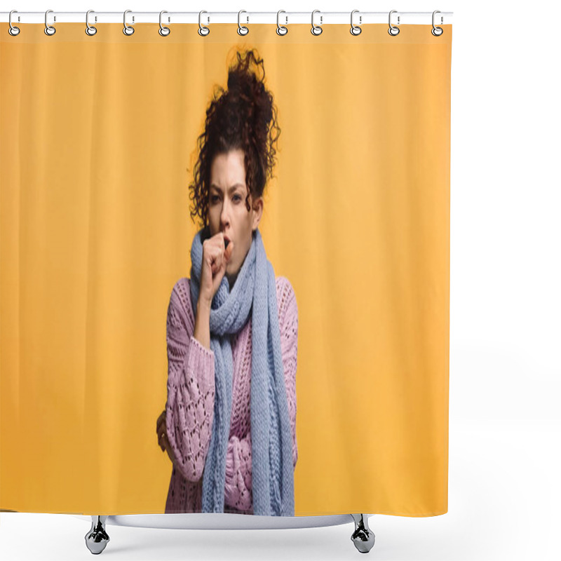 Personality  sick woman in knitted sweater and scarf coughing isolated on orange shower curtains