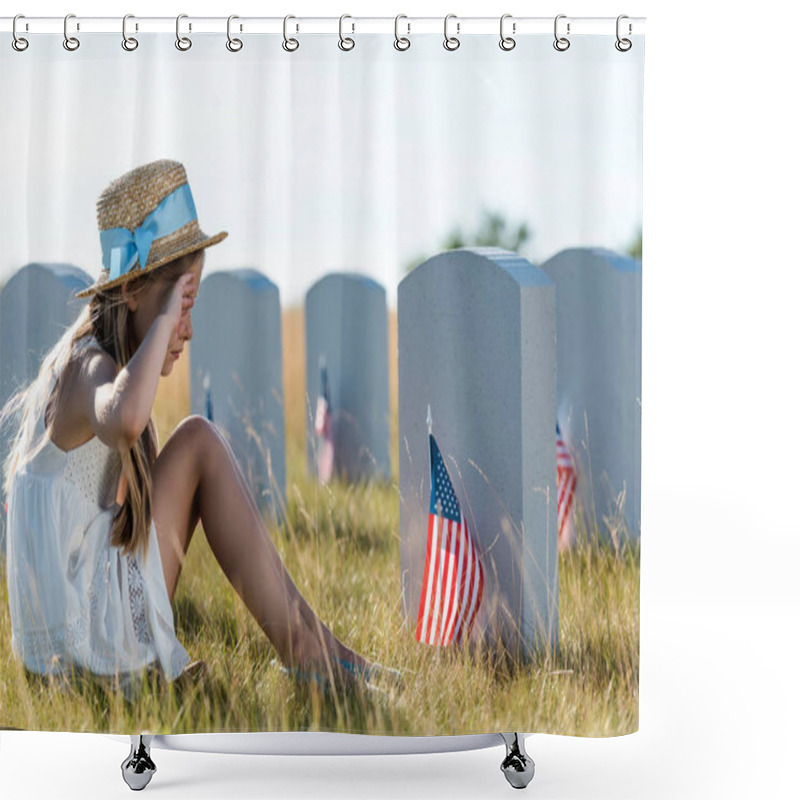 Personality  kid in straw hat touching face while sitting near headstones with american flags  shower curtains