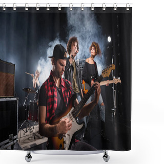 Personality  KYIV, UKRAINE - AUGUST 25, 2020: Rock Band Musician Playing Bass Guitar Sitting Near Curly Vocalist And Guitarist With Smoke And Female Drummer On Background Shower Curtains