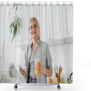 Personality  Tattooed And Happy Woman With Bangs And Eyeglasses Holding Glass Of Orange Juice And Smartphone While Looking At Camera Near Clean Dishes And Blurred Green Plants In Modern Apartment  Shower Curtains