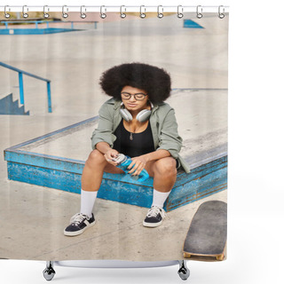 Personality  A Young African American Woman With Curly Hair Is Sitting On Top Of A Blue Box Next To A Skateboard In An Urban Skate Park. Shower Curtains