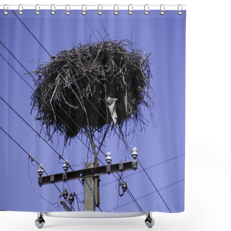 Personality  Empty stork nest made with branches at the top of an electrical tower shower curtains