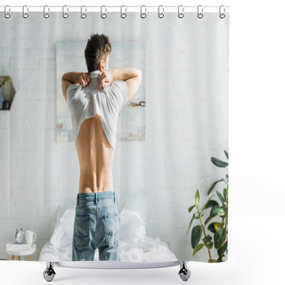 Personality  Man In Blue Jeans Standing Backwards Near Bed And Taking Off White T-shirt In Bedroom Shower Curtains