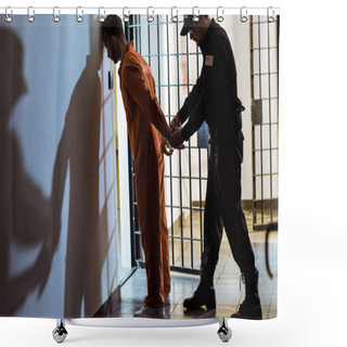 Personality  Side View Of Prison Officer Wearing Handcuffs On Prisoner Shower Curtains