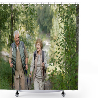 Personality  Cheerful Mature Active Couple Enjoying Trekking In The Forest Or Park While Moving Between Bushes Shower Curtains