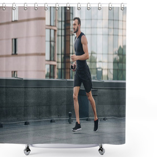 Personality  Side View Of Handsome Sportsman Running And Listening Music With Smartphone On Roof Shower Curtains