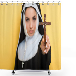 Personality  Selective Focus Of Beautiful Nun Holding Cross Isolated On Yellow Shower Curtains