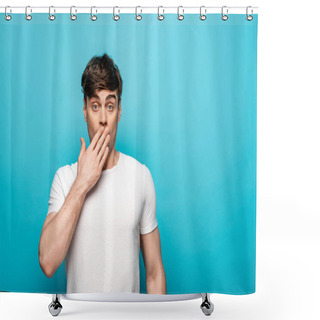 Personality  Shocked Young Man Covering Mouth With Hand While Looking At Camera On Blue Background Shower Curtains