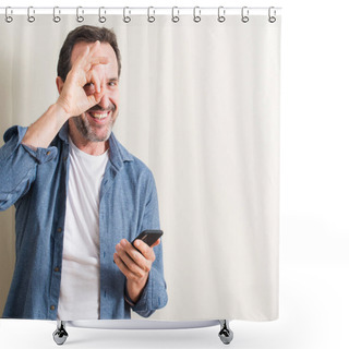 Personality  Senior Man Using Smartphone With Happy Face Smiling Doing Ok Sign With Hand On Eye Looking Through Fingers Shower Curtains