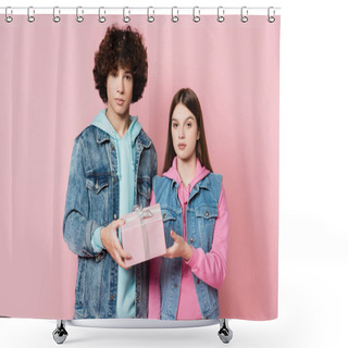 Personality  Teen Couple Looking At Camera While Holding Present Isolated On Pink  Shower Curtains