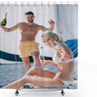 Personality  Selective Focus Of Smiling Woman Showing Glass Of Champagne And Her Boyfriend Standing Behind On Yacht  Shower Curtains