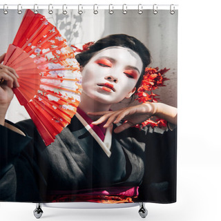 Personality  Portrait Of Beautiful Geisha With Red And White Makeup Holding Hand Fan And Touching Face In Sunlight Shower Curtains