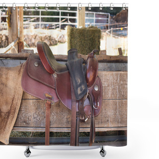 Personality  The Saddle Is Brown On The Fence In A Shallow Depth Of Field. Leather Saddle, Harness For Horses. Western Saddles For Horses On The Rack, Ready For Dressage Training. Equestrian Sport Background. Shower Curtains