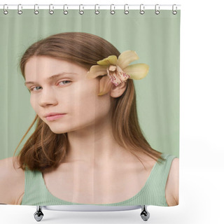 Personality  Vertical Close-up Studio Portrait Of Young Caucasian Woman With Clean Girl Look And Fresh Orchid Flower In Hair Looking At Camera Shower Curtains