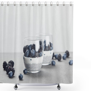 Personality  Selective Focus Of Tasty Yogurt With Chia Seeds, Blueberries And Blackberries In Glasses Near Scattered Berries On Marble Surface Isolated On Grey Shower Curtains