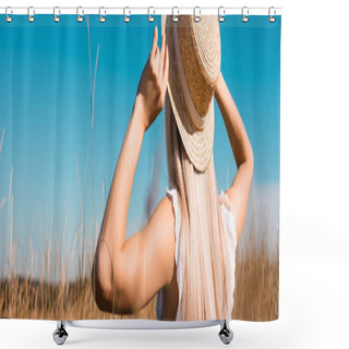 Personality  Back View Of Blonde Woman Touching Straw Hat In Grassy Field Against Blue Sky, Horizontal Image Shower Curtains