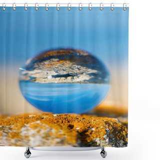 Personality   Upside Down Seascape With Blue Sky And Overgrown With Moss Rocks - Reflection In A Lensball - Selective Focus, Space For Text Shower Curtains