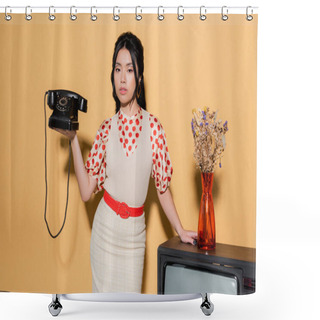 Personality  Asian Model Holding Retro Telephone Near Flowers On Tv On Orange Background Shower Curtains
