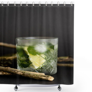 Personality  Faceted Cold Glass With Melting Ice Cubes And Sliced Lime Near Wooden Sticks On Black  Shower Curtains