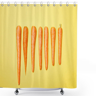 Personality  Top View Of Carrots In Row On Yellow Background Shower Curtains
