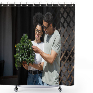 Personality  Cheerful African American Couple Holding Houseplant While Standing Near New House Outdoors Shower Curtains